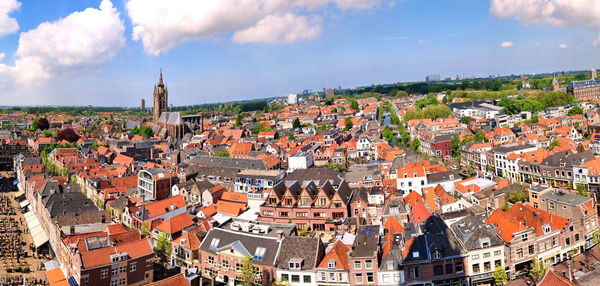 Aerial view of city against sky