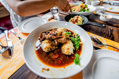 High angle view of food served on table