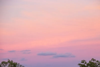 Low angle view of dramatic sky during sunset