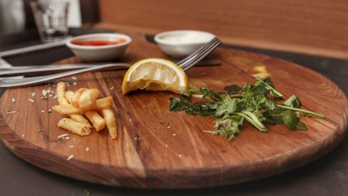 Close-up of fruits in plate on table