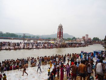 Group of people in front of holy river 'ganga'