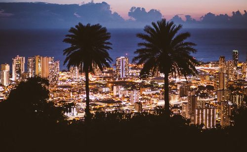 View of city lit up at night