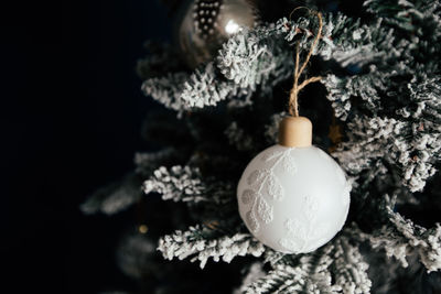 Close-up of christmas decoration hanging on tree