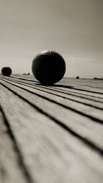 Close-up of wood against sky