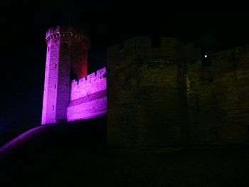 Low angle view of illuminated built structure