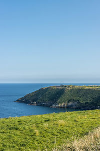 Scenic view of sea against clear sky