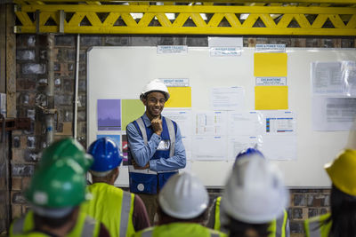 Construction engineers getting a safety briefing