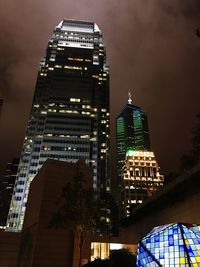 Low angle view of illuminated office building