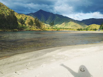 Scenic view of beach against sky