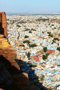 Cityscape against sky seen through mehrangarh fort