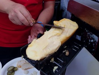 Close-up of person preparing food