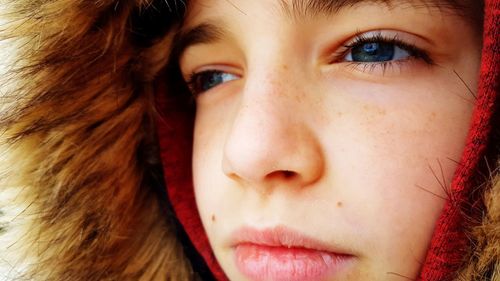 Close-up of boy in warm clothing