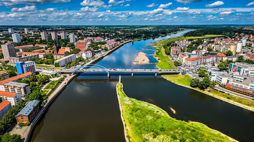 Aerial view of bridge over river in city