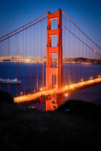 View of suspension bridge at dusk