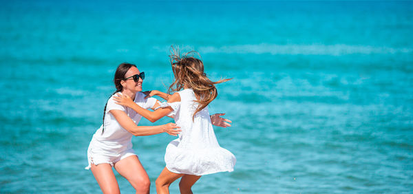 Woman standing at beach