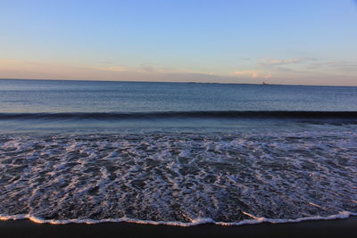 Scenic view of sea at sunset