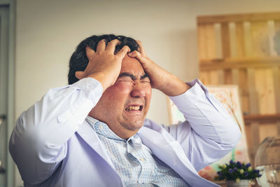 Frustrated businessman at office