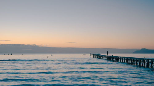 Scenic view of sea against clear sky