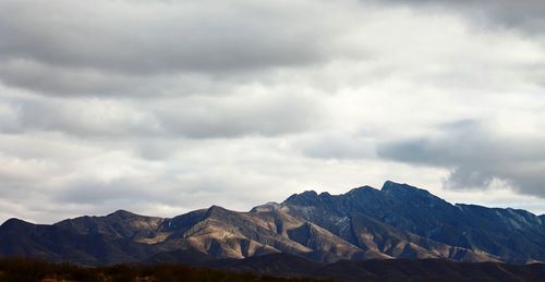 View of franklin mountains against cloudy sky