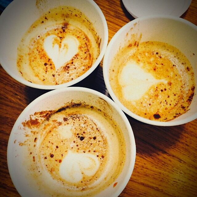 food and drink, coffee cup, drink, coffee - drink, refreshment, frothy drink, saucer, indoors, froth art, cappuccino, table, freshness, coffee, still life, close-up, brown, cup, high angle view, latte, no people