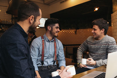 Business people having drink in cafe