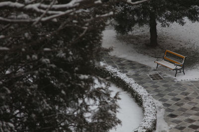 High angle view of empty bench in swimming pool