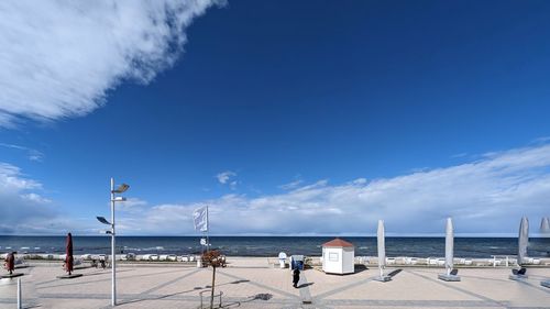 Scenic view of sea against blue sky