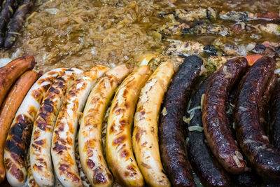 High angle view of meat on barbecue grill