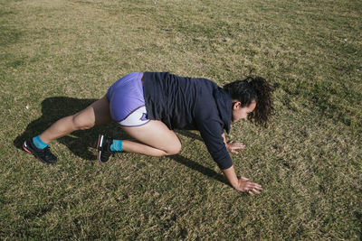 Girl running in the grass