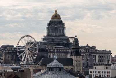 Brussels, belgium, march 17, 2023. courthouse and ferris wheel 