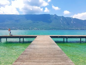 Pier over sea against sky