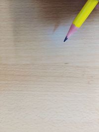 Close-up of pencil on white surface