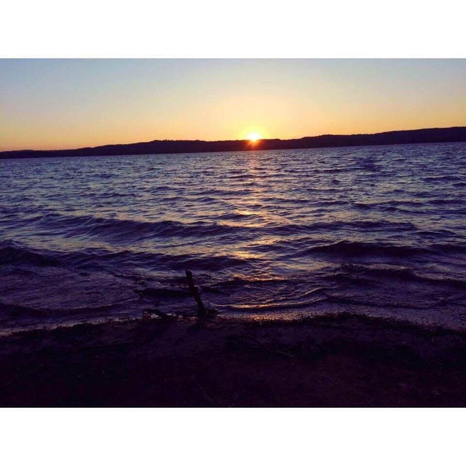 sunset, sea, nature, sun, water, scenics, beauty in nature, tranquil scene, tranquility, sunlight, no people, outdoors, clear sky, silhouette, wave, beach, sky, horizon over water, day