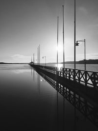 Scenic view of river against sky during sunset