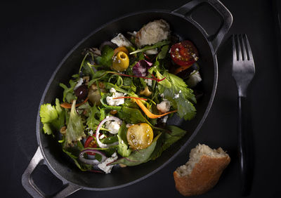 High angle view of salad in bowl on table