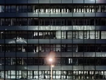 Low angle view of modern building at night