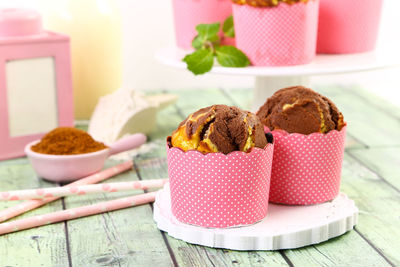 Chocolate muffins on table