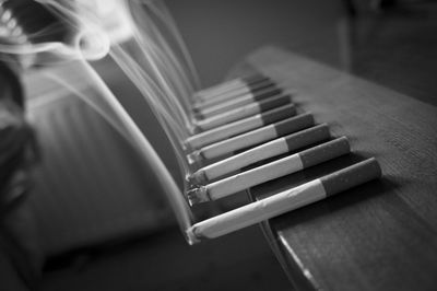 High angle view of piano keys on table