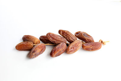 Close-up of fruits against white background