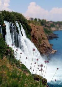 High angle view of waterfall against sky