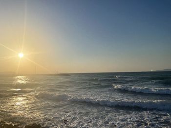 Scenic view of sea against sky during sunset