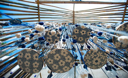 Close-up of decorations hanging on ceiling