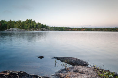 Scenic view of lake against clear sky