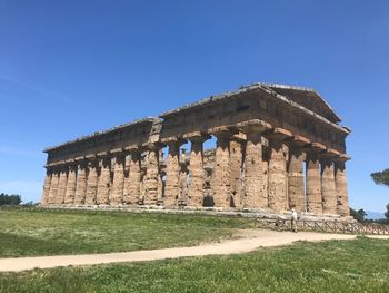 View of historical building against clear blue sky