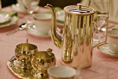 Close-up of table, dishes and silverware