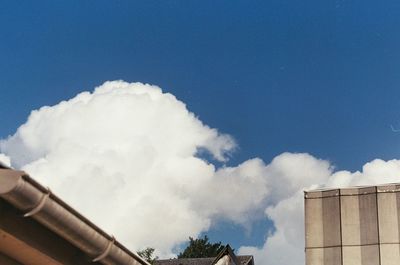 Low angle view of building against blue sky