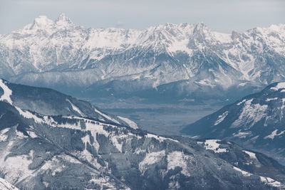 Scenic view of snow covered mountains