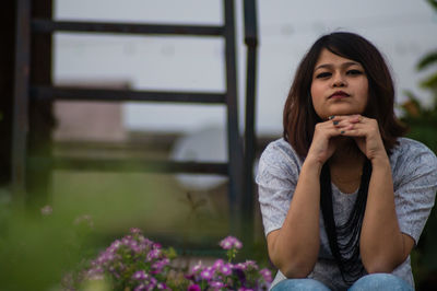 Woman sitting on a table