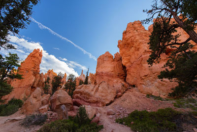 Rock formations on mountain against sky