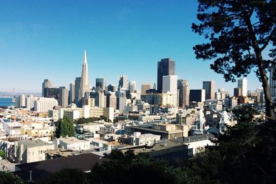 Cityscape against blue sky